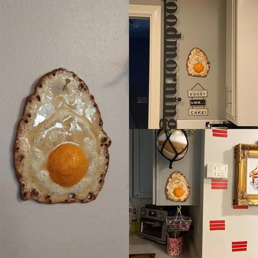 Fried egg hanging on a nail sculpture